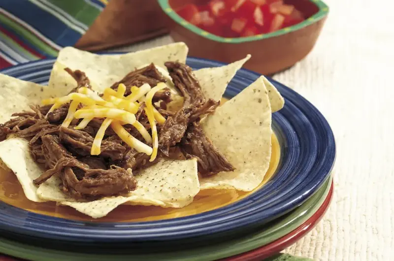 Beefy Queso Nachos Slow Cooker Recipe